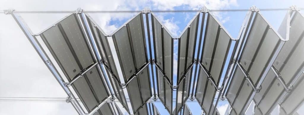 Folding solar panel roofs at rest stops